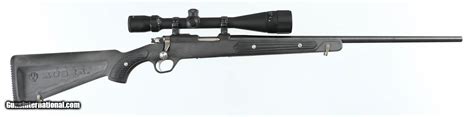 RUGER M77/17 17 HMR RIFLE WITH SCOPE (ZYTEL STOCK)