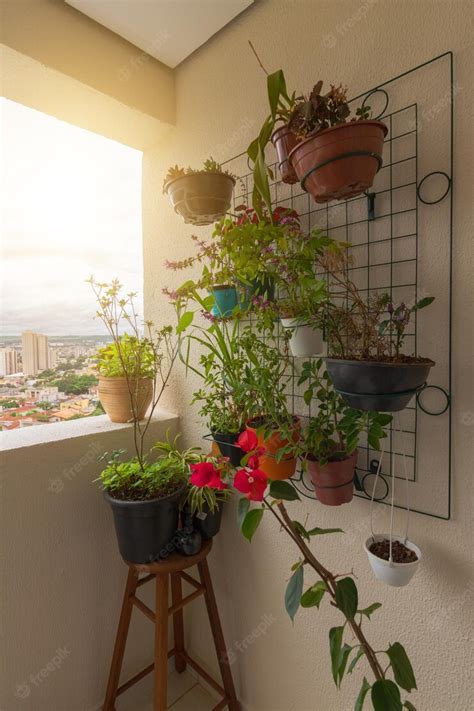 Premium Photo | Vertical garden on the balcony of the building various ...