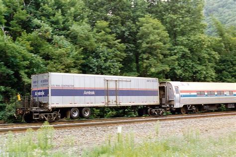 Amtrak Roadrailer AMTZ 40009 heading eastbound on Horseshoe Curve, PA ...