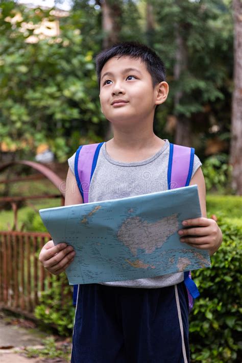 Asian Chinese Little Boy Holding Map in the Forest Stock Photo - Image of exploration ...