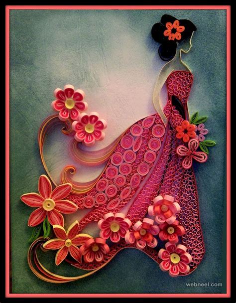 paper quilled artwork with flowers and a woman's dress