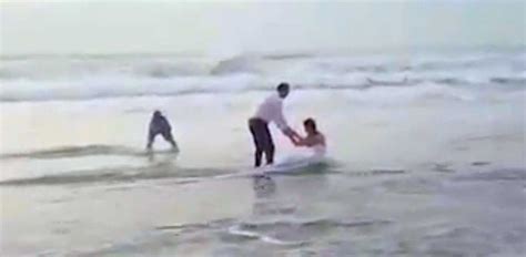 Beach Wedding Photo Goes Terribly Wrong | LittleThings.com