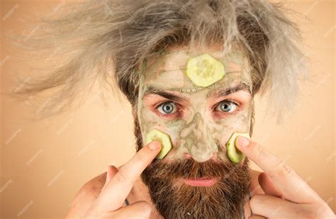 Premium Photo | Funny man in a face mask in a beauty salon Facial treatment