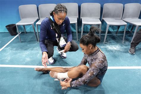 Simone Biles shakes off calf injury to dominate during Olympic ...