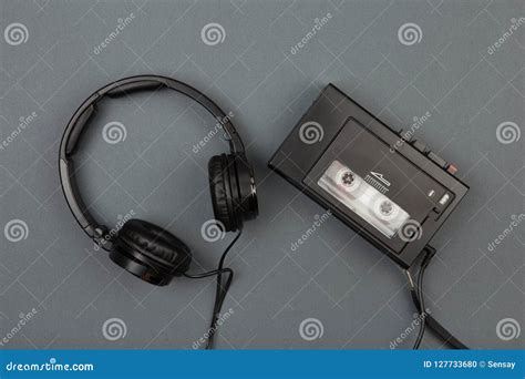 Retro Cassette Player With Headphones On Grey Background Stock Photo ...