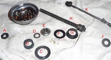 how to reassemble mountain bike rear wheel hub and bearings - Bicycles Stack Exchange