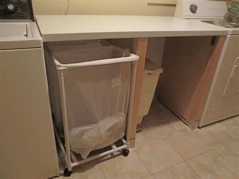 Laundry folding station out of a dishwasher cabinet - IKEA Hackers - IKEA Hackers
