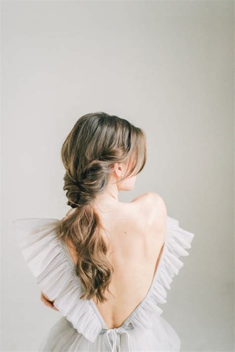 A Woman in White Backless Dress · Free Stock Photo