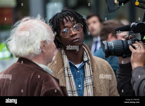 look into the camera Stock Photo - Alamy