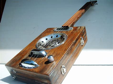 cigar box guitar 3 strings