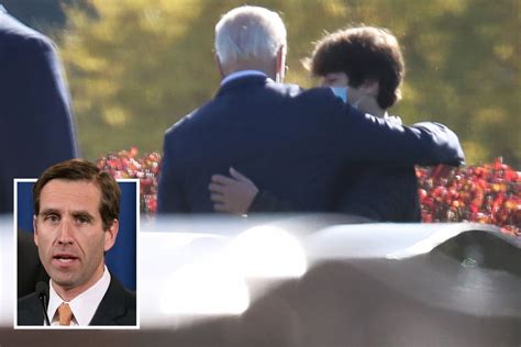 Biden hugs his grandson as he visits late son Beau's grave on first day ...