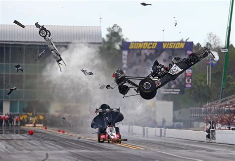 Larry Dixon's Top Fuel dragster crashes during qualifying for the 2015 Gatornationals in ...