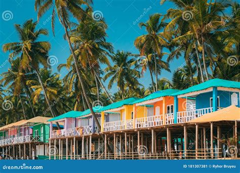 Canacona, Goa, India. Famous Painted Guest Houses on Beach Against Background of Tall Palm Trees ...