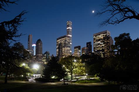 Central Park at night with skyline of Midtown NYC