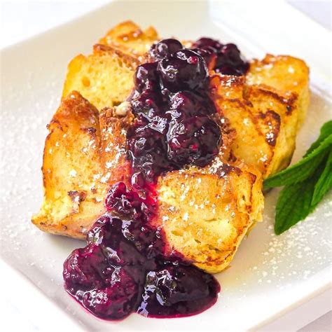 Bread Pudding French Toast w/ Mixed Berry Compote. A real brunch treat!