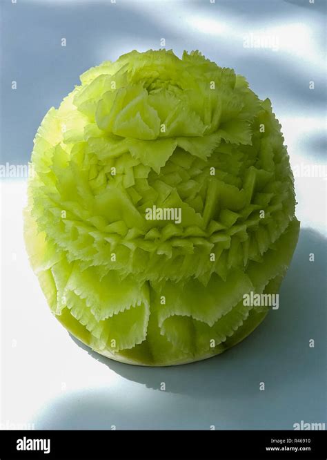 cantaloupe melon carving display Stock Photo - Alamy