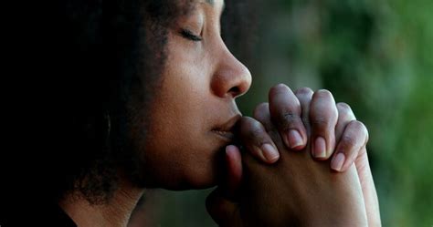 African American Woman Praying Hands