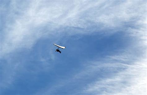 Watch This Hang Glider Hold Onto His Instructor After Not Being ...