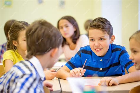 Premium Photo | Education, elementary school, learning and people concept - group of school kids ...