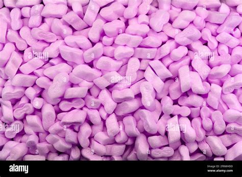 Packing peanuts purple bubbly plastic protective granules Styrofoam chips Background Safe ...