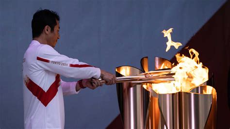 Olympic Torch Relay Kicks Off In Japan : Live Updates: The Tokyo Olympics : NPR