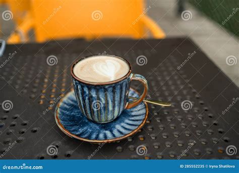 Hot Coffee, Milk, Floral Foam and Aromatic Coffee Cups White Cup is Ready To Serve Customers in ...