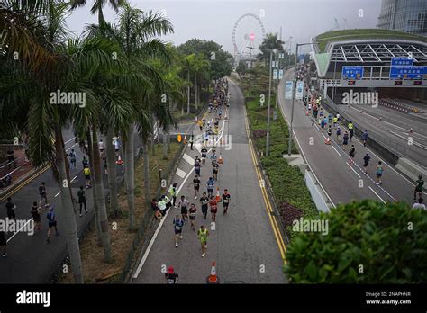 Participants of the Hong Kong Marathon 2023 run through Central, Hong ...