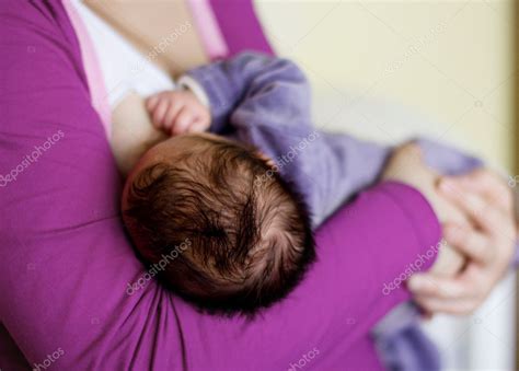 Feeding newborn baby — Stock Photo © MitaStockImages #11376335
