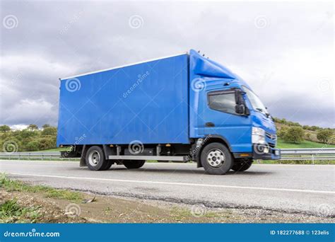 Blue delivery Truck stock photo. Image of forest, freeway - 182277688