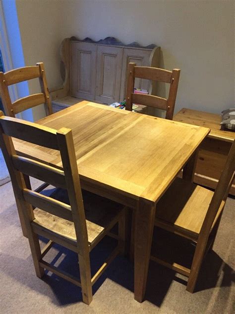 Solid wood dining room/kitchen table and 4 chairs, extending table to ...