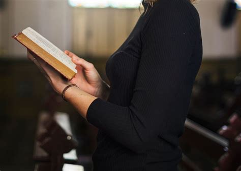 Woman praying in the church | Premium Photo - rawpixel