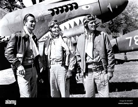 FLYING TIGERS (1942) JOHN WAYNE, JOHN CARROLL FTGS 001 P Stock Photo - Alamy