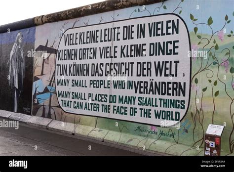 A close up of a famous quote and graffiti on the Berlin Wall Stock Photo - Alamy