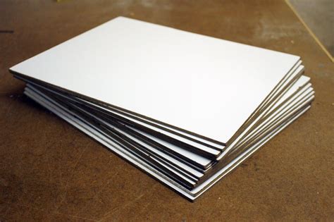 stack of white cards sitting on top of each other