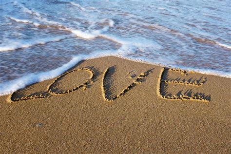 Word LOVE Written On The Sand At The Beach Stock Image - Image of ...