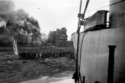 British troops under fire on Juno beach at Normandy shortly after the D-Day landings D Day ...