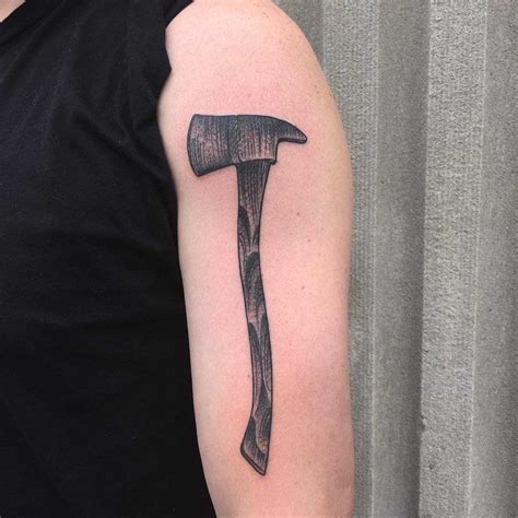 Axe tattoo by Tine DeFiore - Tattoogrid.net