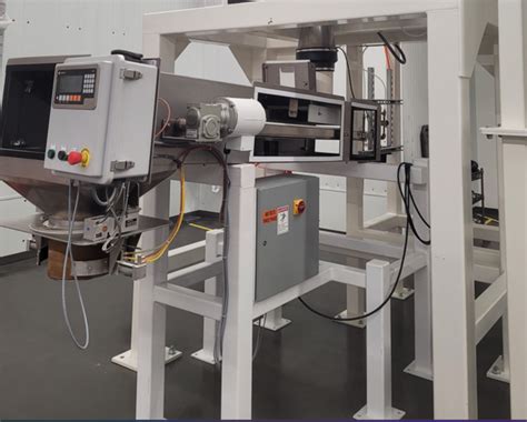 Used Hartman Scale Screw Feeder SF-3-S4-5 with Eriez Metal Detection