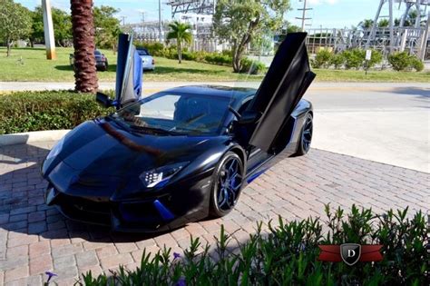 Unique Black and Blue Lamborghini Aventador For Sale - GTspirit