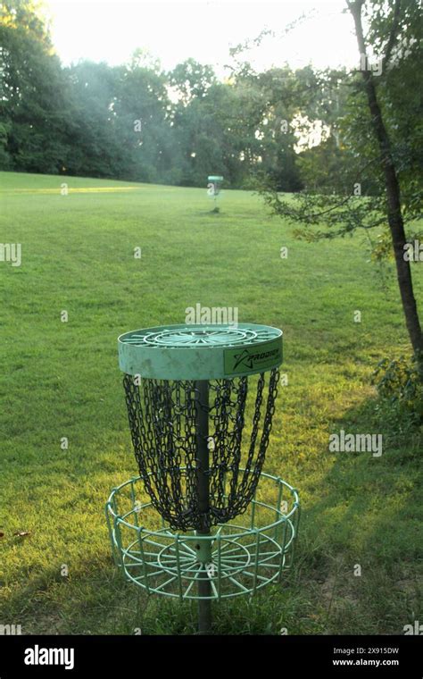 Disc (frisbee) golf baskets in a park in the U.S.A Stock Photo - Alamy