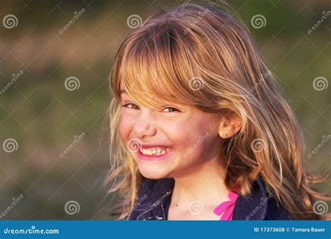 Little Girl with Cheeky Smile Stock Photo - Image of childhood, delight ...