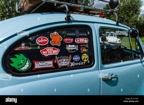 VW beetle decorated with a variety of stickers Stock Photo: 69987121 - Alamy