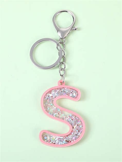 a pink and silver glitter letter s keychain