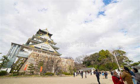 Tourists are Walking Around Osaka Castle in Winter. Editorial Photo - Image of building ...