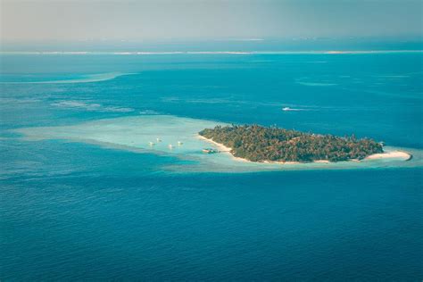 Tropical Islands And Atolls In Maldives Photograph by Levente Bodo - Fine Art America