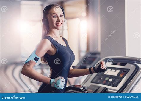 Happy Women Jogging on a Treadmill for Health. Stock Image - Image of ...