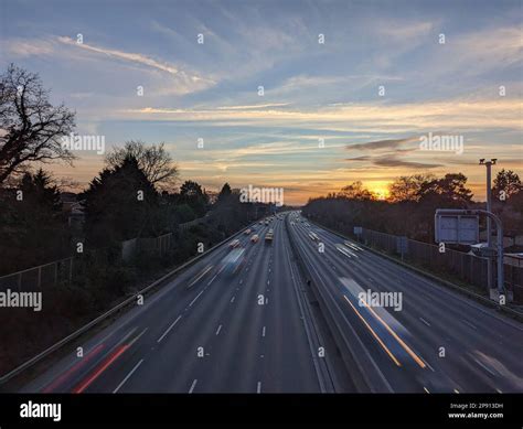 A view of traffic flowing along the M3 motorway between junctions 3 and ...