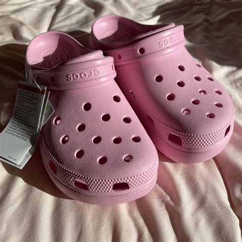 Unworn light pink platform crocs with Sanrio charms. - Depop