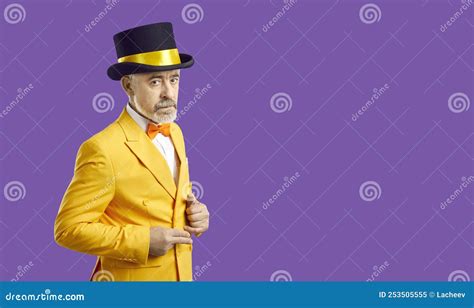 Senior Man in Bright Jacket with Serious Facial Expression Poses on Purple Background. Stock ...