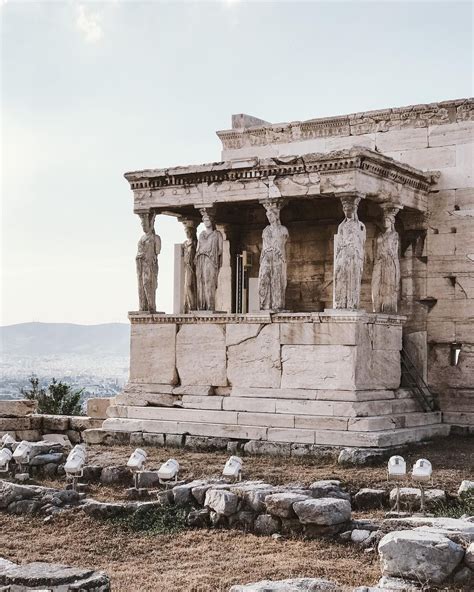 The Erechtheion sits on the north side of the Acropolis in Athens My ...